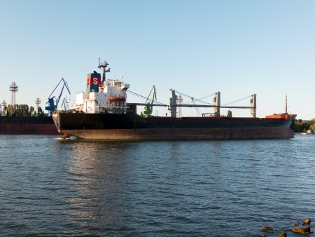 VARNA, BULGARIA - JULY 21: Bulk carrier SIDER FAIOCH, Flag: Italy, Year Built: 1986, sails into open sea on July 21, 2012 in Varna, Bulgaria. Ship`s next destination is Taman, Russia.のeditorial素材