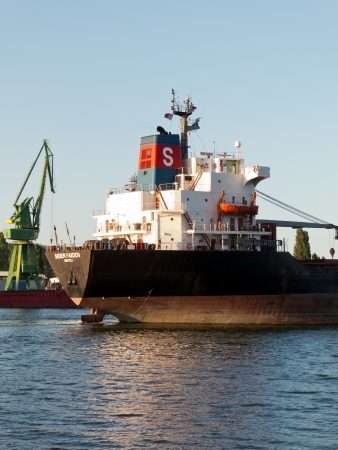 VARNA, BULGARIA - JULY 21: Bulk carrier SIDER FAIOCH, Flag: Italy, Year Built: 1986, sails into open sea on July 21, 2012 in Varna, Bulgaria. Ship`s next destination is Taman, Russia.のeditorial素材