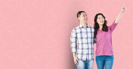 Digital composite of loving couple on graphic backgroundの写真素材