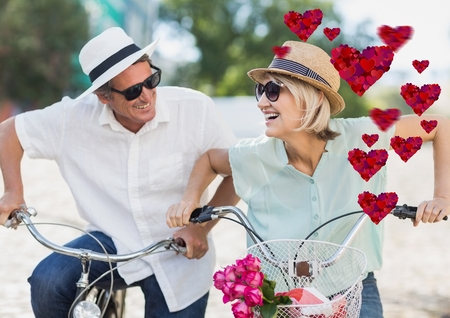 Composite image of romantic senior couple having funの写真素材