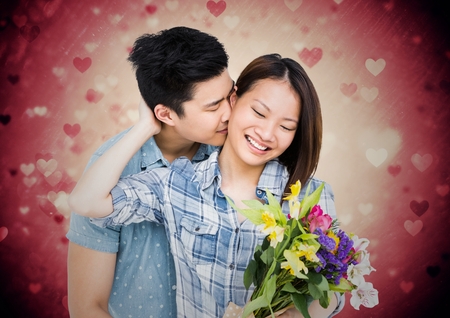 Composite image of romantic couple embracing each otherの写真素材
