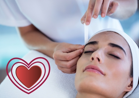 Beautiful woman receiving massage at spa center