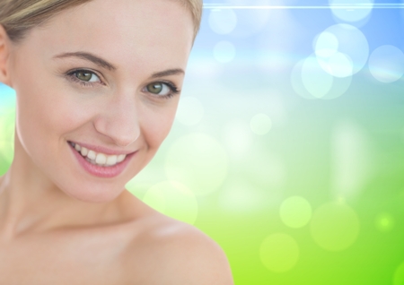 Portrait of beautiful woman against bokehの写真素材
