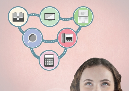 Digital composite image of woman glancing upward at connecting application iconの写真素材