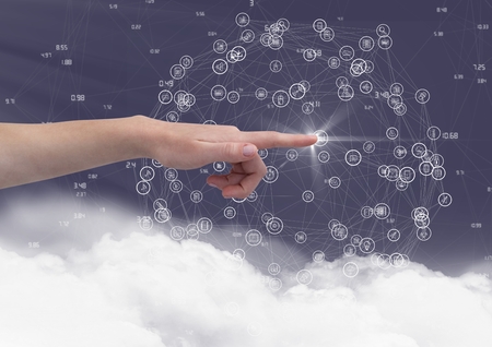 Close-up of hand touching digitally generated icon against sky background