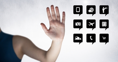 Close-up of hand besides digitally generated applications iconの写真素材