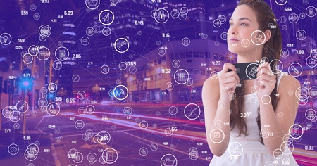 Digital composite of Woman with phone against Night city with connectors