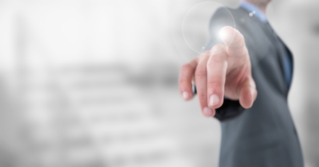 Digital composite of Business man mid section with flare against blurry stairs
