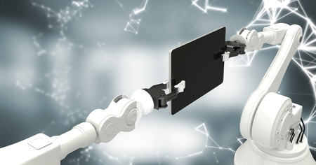 Digital composite of White robot claws with device and white interface against blurry grey roomの写真素材