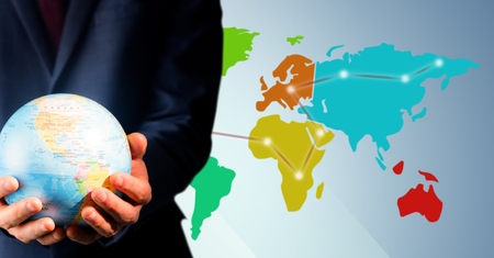 Digital composite of Close up of travel agent holding globe against map with lights