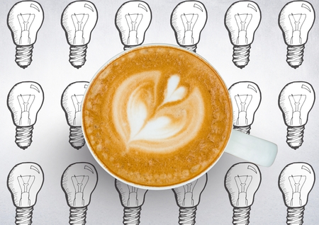 Digital composite of Coffee cup against white background with lightbulbsの写真素材