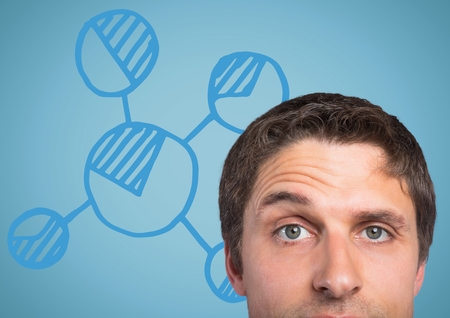 Digital composite of Top of man's head against blue graph and background