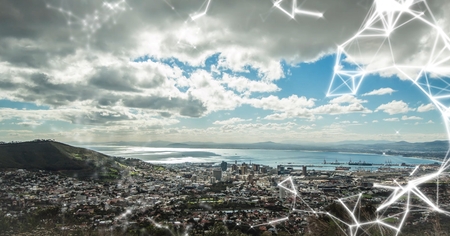 Digital composite of White network against coastlineの写真素材