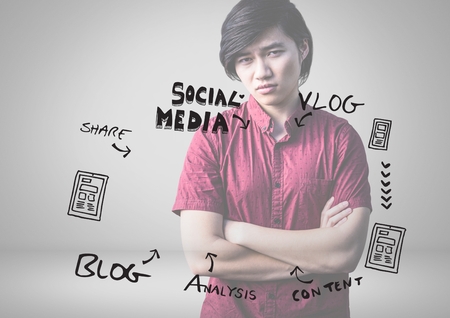 Digital composite of Young man with social media graphics drawingsの写真素材