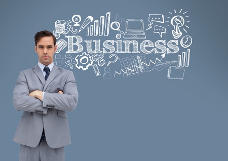 Digital composite of Businessman with business drawings graphics and textの写真素材