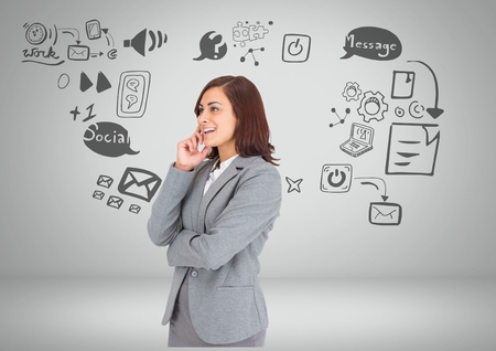 Digital composite of Businesswoman with social media graphic drawingsの写真素材