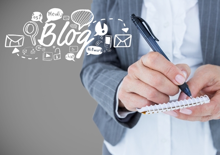 Digital composite of Businessman with blog and Business graphics drawingsの写真素材