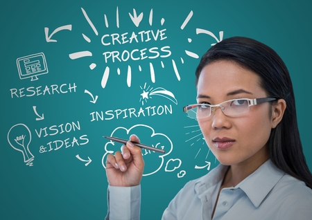 Digital composite of Woman with pen and white design doodles against teal backgroundの写真素材