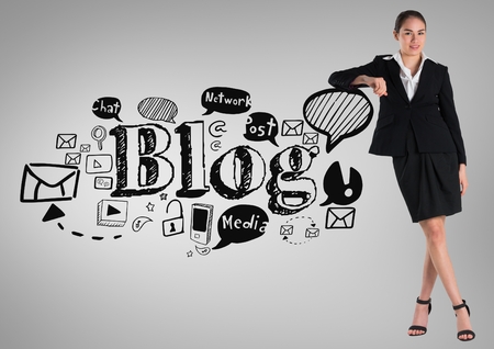 Digital composite of Businesswoman with social media blog graphics drawingsの写真素材