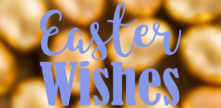 Easter greeting against close-up of golden easter eggs