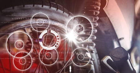 Digital composite of Close up of wheel with white interface and flareの写真素材