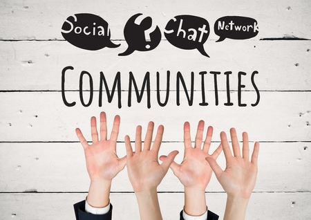 Digital composite of Many hands reaching with Communites text with drawings graphicsの写真素材