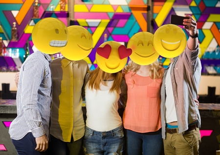 Digital composite of selfie in the party. Emoji heads.の写真素材