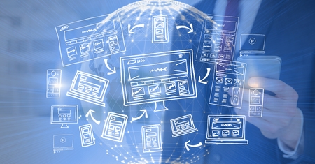 Digital composite of Web desaign graphic with technological earth and a man with mobile