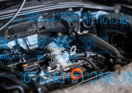 Digital composite of Car engine with blue binary code