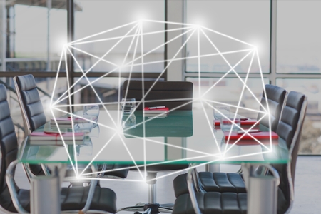Digital composite of Digitally generated image of tech graphics in conference roomの写真素材