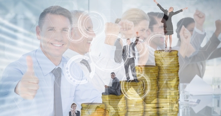 Digital composite of Digitally generated image of business people on coins with employees in backgroundの写真素材