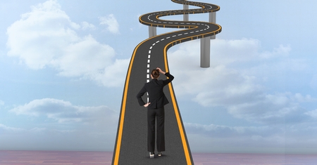 Digital composite of Digital composite image of confused businesswoman on curvy bridgeの写真素材