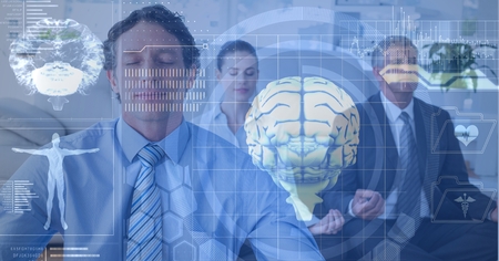 Digital composite of Double exposure of brains and business people meditating