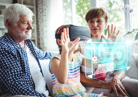Digital composite of Child wearing VR Virtual Reality Headset with Interface with Grandparents