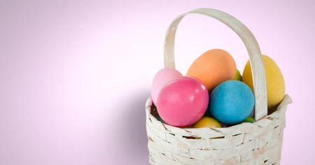 Digital composite of Easter eggs in front of pink background