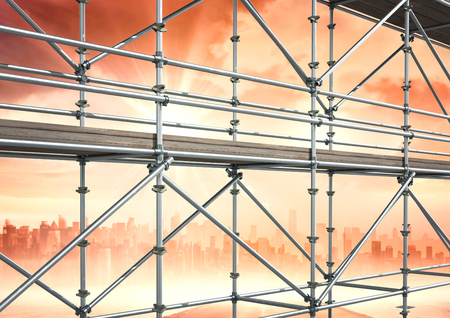 Digital composite of 3D scaffolding whith sunset on the city backgroundの写真素材