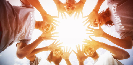 Hands forming a circle low angleの写真素材