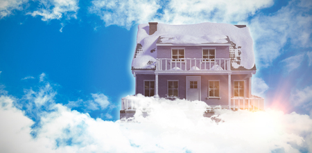 Digital composite of 3d house in blue skyの写真素材