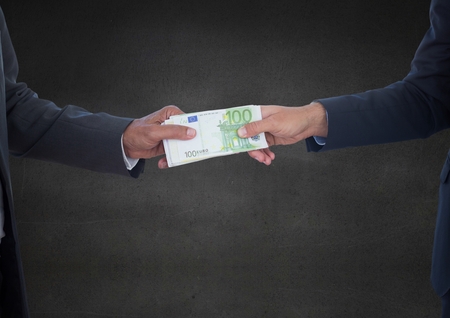 Digital composite of Business money exchange against grey wallの写真素材