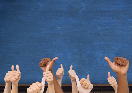 Digital composite of Thumbs up blue blackboardの写真素材