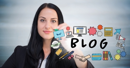 Digital composite of Business woman with marker behind blog doodles with flare against blurry grey wood panelの写真素材