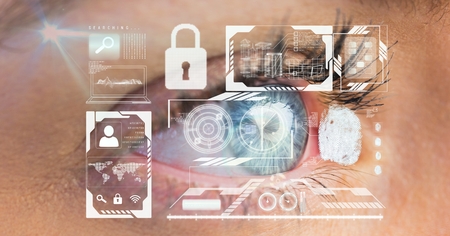 Digital composite of Close-up of eye with various icons on virtual screenの写真素材