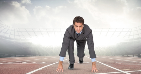 Digital composite of Digitally generated image of businessman at starting point on racing track