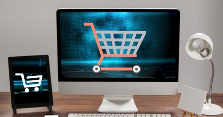 Digital composite of Shopping cart signs on screensの写真素材