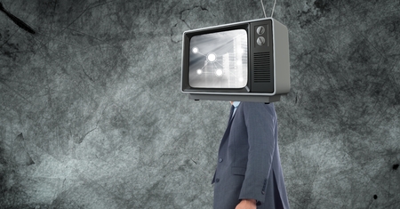 Digital composite of Digital composite image of TV on businessman's headの写真素材