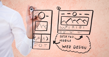 Digital composite of Cropped image of businesswoman drawing mock ups of websiteの写真素材