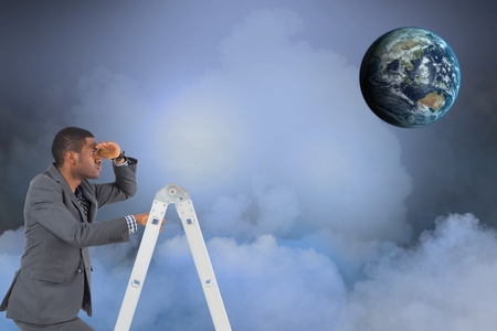 Digital composite of Digital composite image of businessman on ladder looking at globe in skyの写真素材
