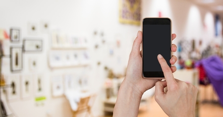 Digital composite of Hands using smart phone with blank screenの写真素材