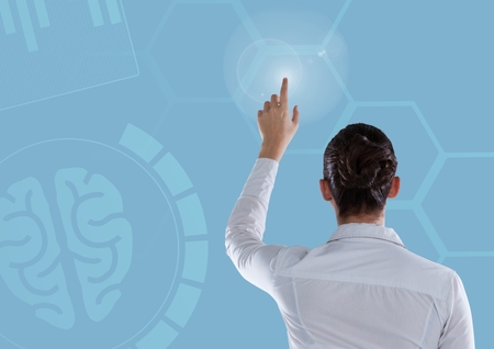 Digital composite of Woman touching interface with blue brain background