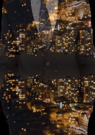 Digital composite of up side down city at night on a suitの写真素材